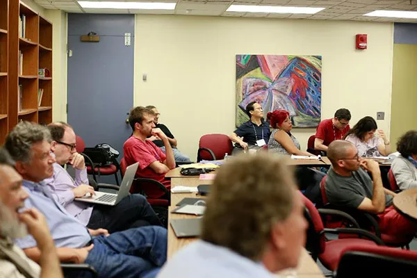 Participants at a Stony Brook game theory workshop
